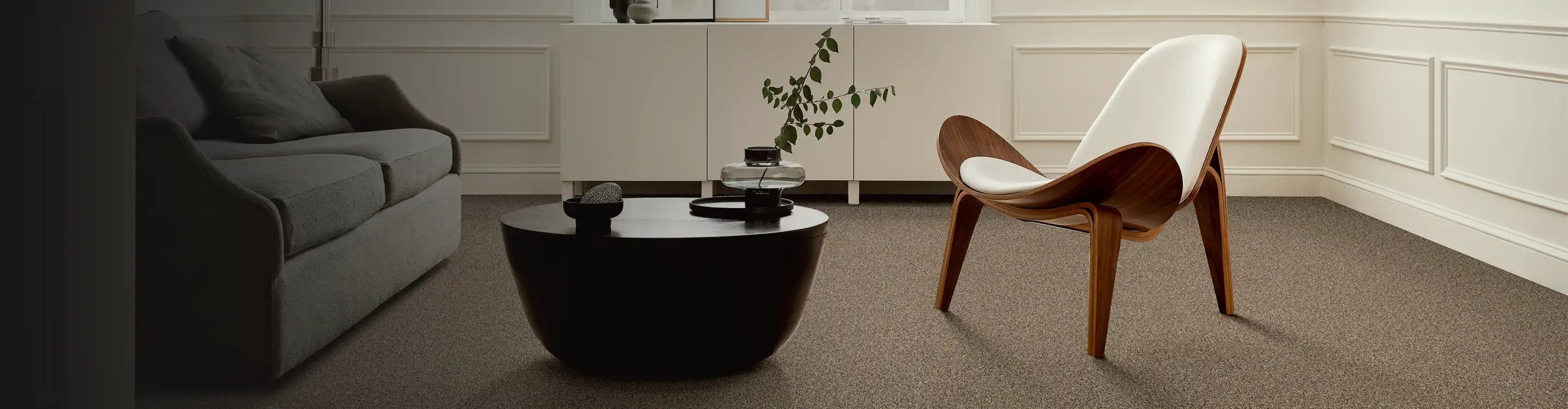 carpet in living room, chair, table
